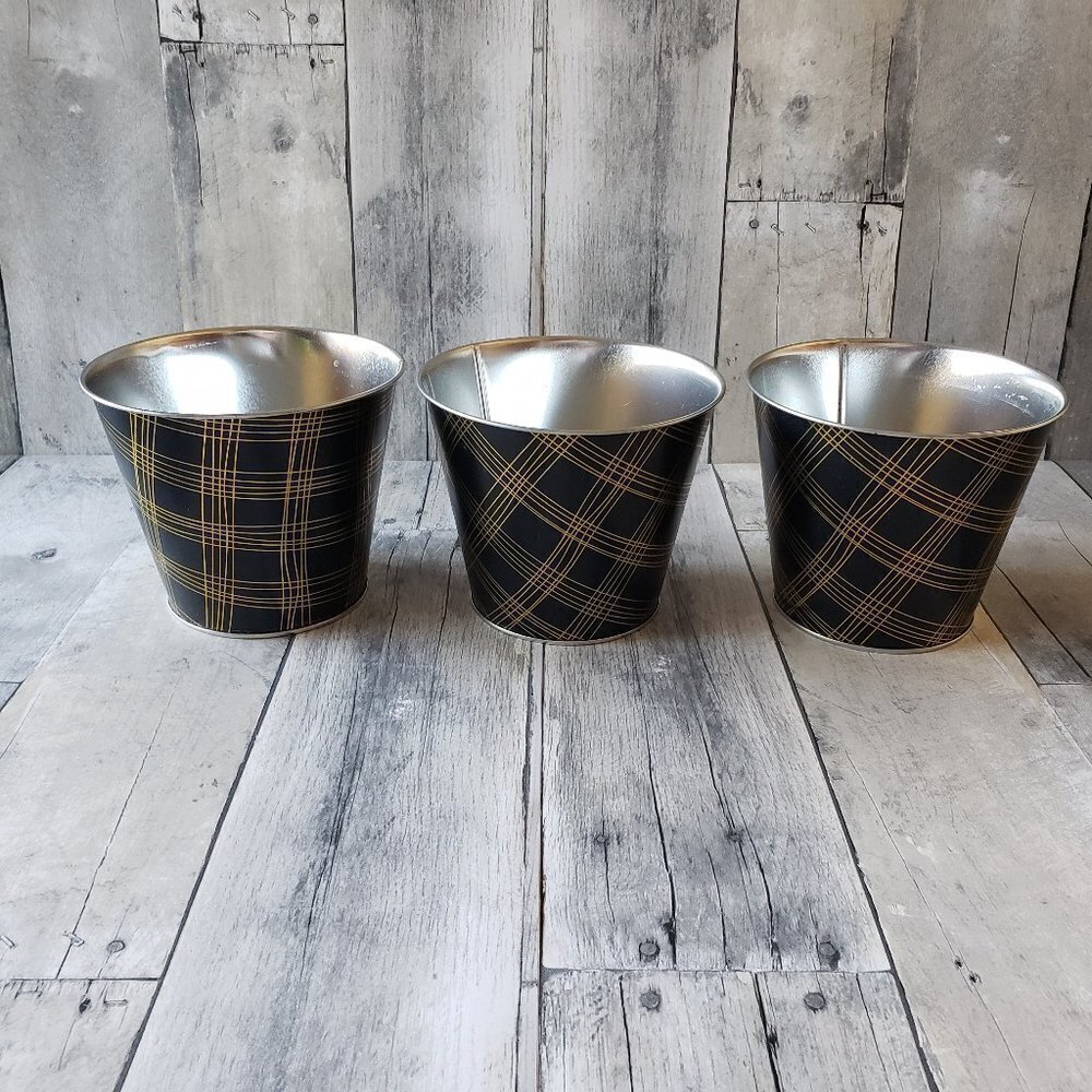 3 Black and Gold Metal Pant Pots